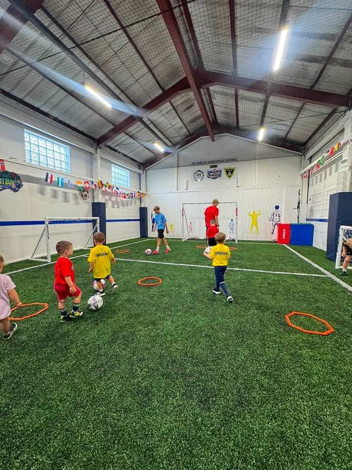 A wide view of the indoor astro pitch in use